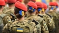 "Tas ir patriotisma gars, kuru nevar salauzt." Ukrainas armijā ir 42 000 sieviešu