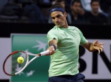 Federers 51 minūti ilgā mačā zaudē tikai trīs geimus
