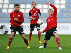 Veseli un ar spēļu praksi - Latvijas futbolisti gatavojas mačam ar Grieķiju